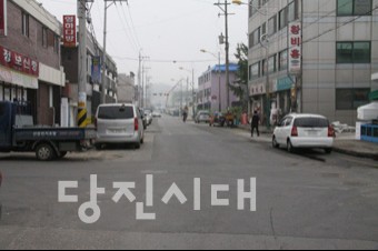 상하수도 임시포장 도로 방치
